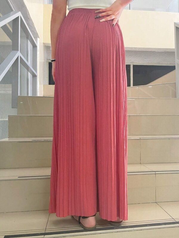 Pantalón rosa de piernas anchas de tela ligera con brillos. Unitalla - Imagen 2