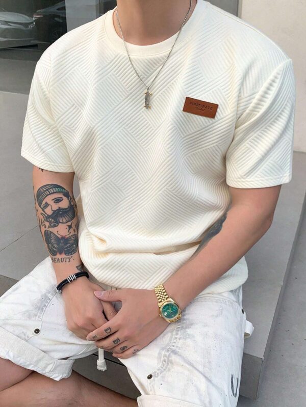 Camiseta con etiqueta First-Rate. Talla S/M
